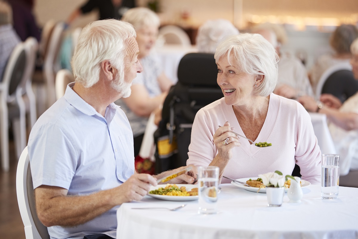 older adult couple dining together